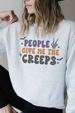 PEOPLE GIVE ME THE CREEPS GRAPHIC SWEATSHIRT