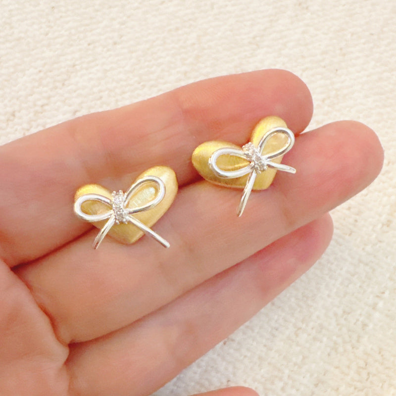 Gold Heart Bow Stud Earrings – Elegant Mixed-Metal Studs with Silver Bow Detail